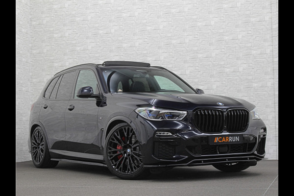 BMW X5 xDrive45e M-Sport | Panorama | 360 Camera | 96% SOH | ACC | Leder Indiv. | Laser-LED | Harman-Kardon | Rij-Assistent Pro | Memory | Head-Up | Trekhaak | 4-Zone Clima | Beker Koeling & Verwarming | Stuurverwarming | Comfortstoelen | Keyless-Entry | M-Gordels | Sfeerverlichting | Carplay |