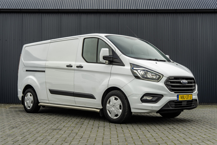 Ford Transit Custom 2.0-TDCI | L2H1 | LED | Inrichting | Omvormer | Cruise | Airco | PDC | Euro 6 Ford Transit Custom 2.0-TDCI | L2H1 | LED | Inrichting | Omvormer | Cruise | Airco | PDC | Euro 6
