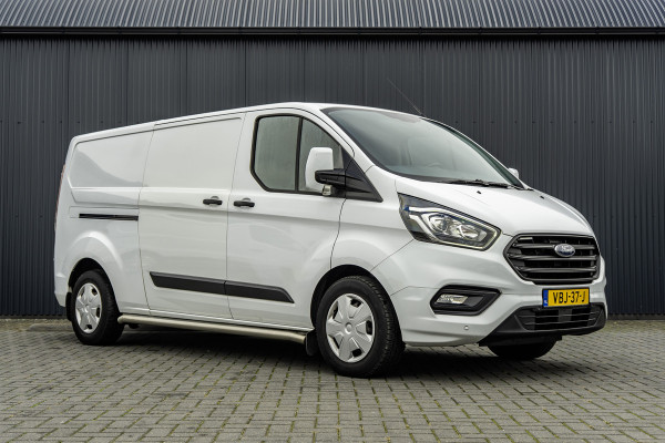 Ford Transit Custom 2.0-TDCI | L2H1 | LED | Inrichting | Omvormer | Cruise | Airco | PDC | Euro 6 Ford Transit Custom 2.0-TDCI | L2H1 | LED | Inrichting | Omvormer | Cruise | Airco | PDC | Euro 6