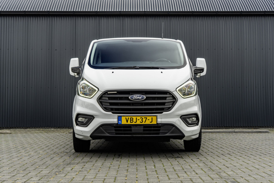 Ford Transit Custom 2.0-TDCI | L2H1 | LED | Inrichting | Omvormer | Cruise | Airco | PDC | Euro 6 Ford Transit Custom 2.0-TDCI | L2H1 | LED | Inrichting | Omvormer | Cruise | Airco | PDC | Euro 6