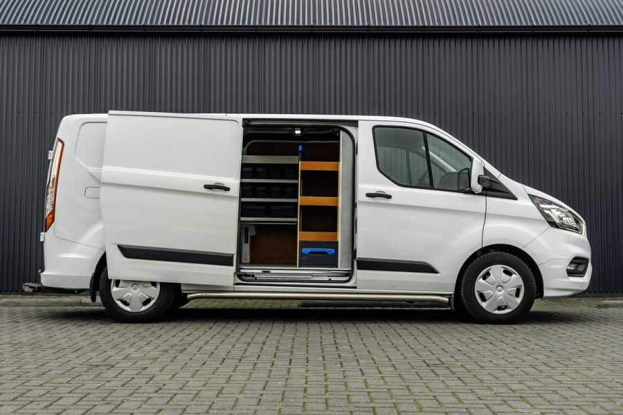 Ford Transit Custom 2.0-TDCI | L2H1 | LED | Inrichting | Omvormer | Cruise | Airco | PDC | Euro 6 Ford Transit Custom 2.0-TDCI | L2H1 | LED | Inrichting | Omvormer | Cruise | Airco | PDC | Euro 6