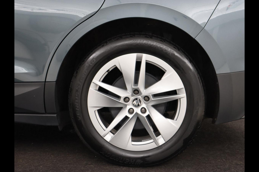 Škoda ENYAQ iV 60 | Trekhaak | Adaptive cruise | Camera | Keyless | Stuurverwarming | Half leder | 19'' | Carplay | Navigatie | Digital Cockpit | Full LED | File Assistent | Parkeerhulp