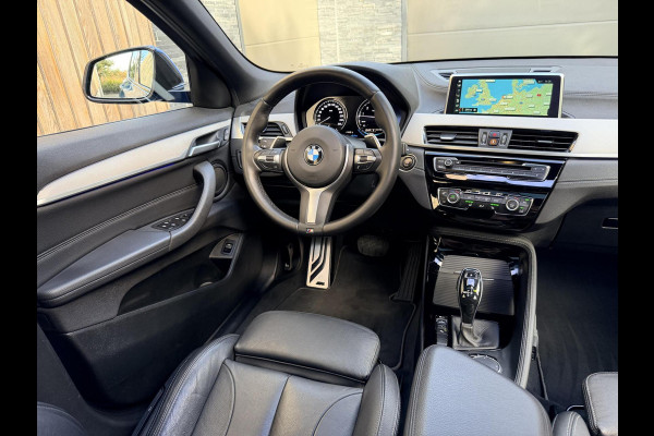 BMW X2 sDrive20i M-sport Automaat | Panoramadak | DAB | LED verlichting | 20 inch | Schakelflippers | Lederen bekleding | Stoelverwarmi BMW X2 sDrive20i M-sport Automaat | Panoramadak | DAB | LED verlichting | 20 inch | Schakelflippers | Lederen bekleding | Stoelverwarmi