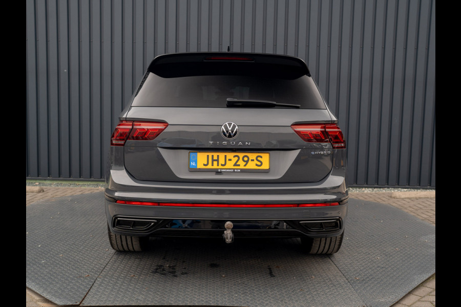 Volkswagen Tiguan 1.4 TSI eHybrid R-Line Business+ | Trekhaak wegkl. | Head Up | Keyless | Side Assist | Elk. A-klep | Prijs Rijklaar!! Volkswagen Tiguan 1.4 TSI eHybrid R-Line Business+ | Trekhaak wegkl. | Head Up | Keyless | Side Assist | Elk. A-klep | Prijs Rijklaar!!