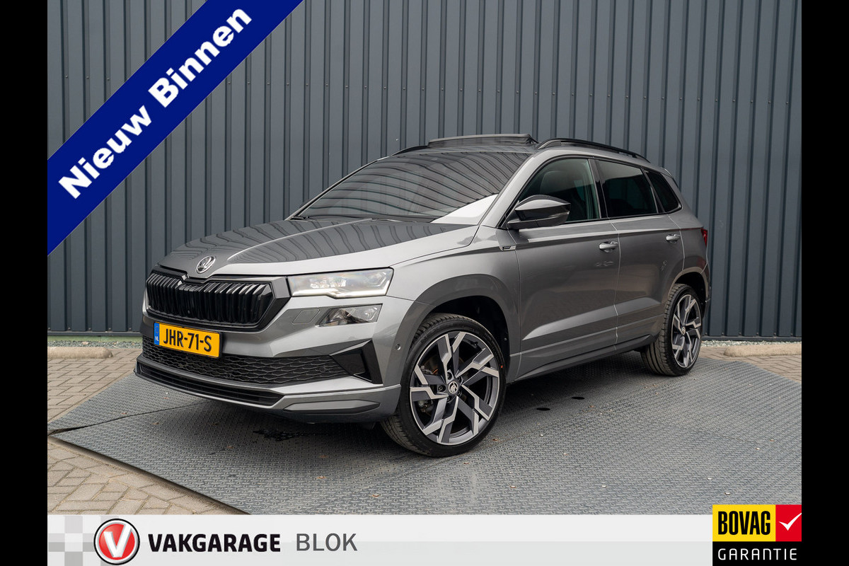 Škoda Karoq 1.5 TSI ACT Sportline Business | Panodak | Trekhaak wegkl. | 360 Camera | 19'' | Elk. A-klep | Prijs Rijklaar!! Škoda Karoq 1.5 TSI ACT Sportline Business | Panodak | Trekhaak wegkl. | 360 Camera | 19'' | Elk. A-klep | Prijs Rijklaar!!