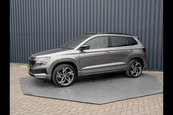 Škoda Karoq 1.5 TSI ACT Sportline Business | Panodak | Trekhaak wegkl. | 360 Camera | 19'' | Elk. A-klep | Prijs Rijklaar!! Škoda Karoq 1.5 TSI ACT Sportline Business | Panodak | Trekhaak wegkl. | 360 Camera | 19'' | Elk. A-klep | Prijs Rijklaar!!