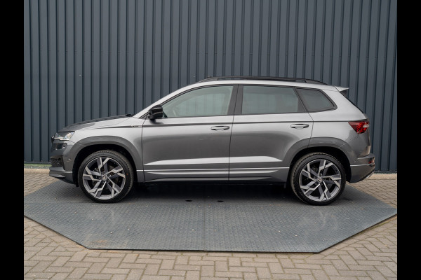 Škoda Karoq 1.5 TSI ACT Sportline Business | Panodak | Trekhaak wegkl. | 360 Camera | 19'' | Elk. A-klep | Prijs Rijklaar!! Škoda Karoq 1.5 TSI ACT Sportline Business | Panodak | Trekhaak wegkl. | 360 Camera | 19'' | Elk. A-klep | Prijs Rijklaar!!
