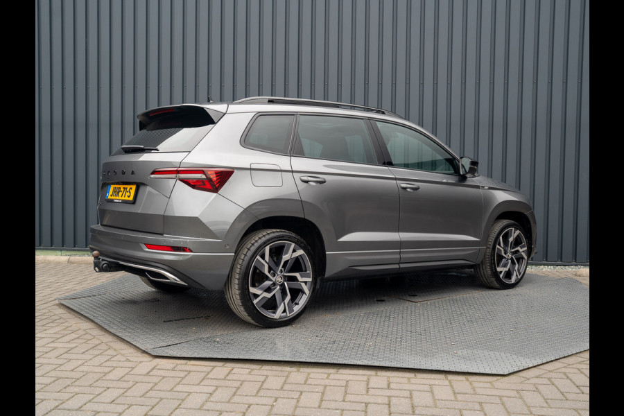 Škoda Karoq 1.5 TSI ACT Sportline Business | Panodak | Trekhaak wegkl. | 360 Camera | 19'' | Elk. A-klep | Prijs Rijklaar!! Škoda Karoq 1.5 TSI ACT Sportline Business | Panodak | Trekhaak wegkl. | 360 Camera | 19'' | Elk. A-klep | Prijs Rijklaar!!