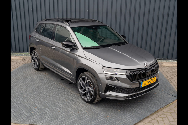 Škoda Karoq 1.5 TSI ACT Sportline Business | Panodak | Trekhaak wegkl. | 360 Camera | 19'' | Elk. A-klep | Prijs Rijklaar!! Škoda Karoq 1.5 TSI ACT Sportline Business | Panodak | Trekhaak wegkl. | 360 Camera | 19'' | Elk. A-klep | Prijs Rijklaar!!