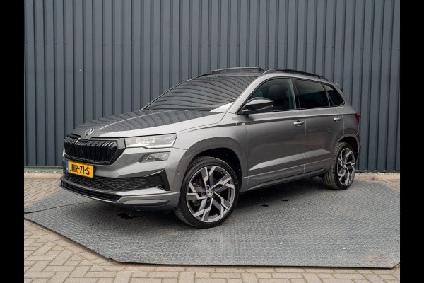 Škoda Karoq 1.5 TSI ACT Sportline Business | Panodak | Trekhaak wegkl. | 360 Camera | 19'' | Elk. A-klep | Prijs Rijklaar!! Škoda Karoq 1.5 TSI ACT Sportline Business | Panodak | Trekhaak wegkl. | 360 Camera | 19'' | Elk. A-klep | Prijs Rijklaar!!
