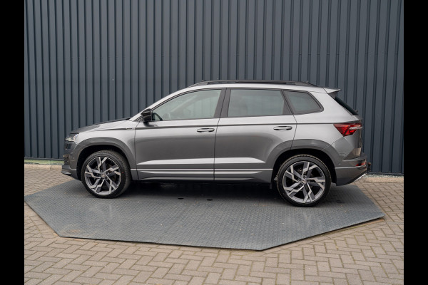 Škoda Karoq 1.5 TSI ACT Sportline Business | Panodak | Trekhaak wegkl. | 360 Camera | 19'' | Elk. A-klep | Prijs Rijklaar!! Škoda Karoq 1.5 TSI ACT Sportline Business | Panodak | Trekhaak wegkl. | 360 Camera | 19'' | Elk. A-klep | Prijs Rijklaar!!