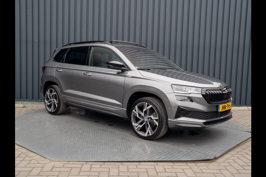 Škoda Karoq 1.5 TSI ACT Sportline Business | Panodak | Trekhaak wegkl. | 360 Camera | 19'' | Elk. A-klep | Prijs Rijklaar!! Škoda Karoq 1.5 TSI ACT Sportline Business | Panodak | Trekhaak wegkl. | 360 Camera | 19'' | Elk. A-klep | Prijs Rijklaar!!