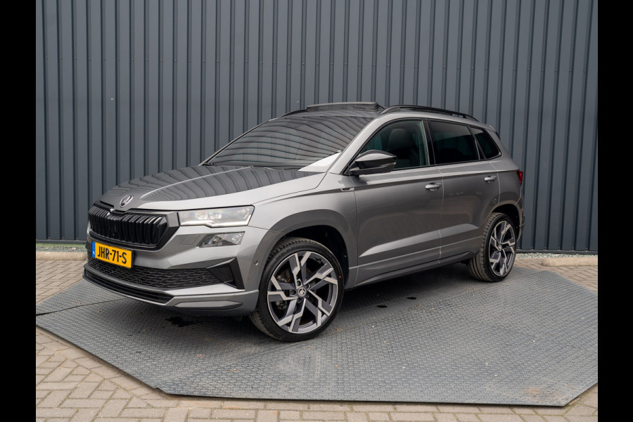 Škoda Karoq 1.5 TSI ACT Sportline Business | Panodak | Trekhaak wegkl. | 360 Camera | 19'' | Elk. A-klep | Prijs Rijklaar!! Škoda Karoq 1.5 TSI ACT Sportline Business | Panodak | Trekhaak wegkl. | 360 Camera | 19'' | Elk. A-klep | Prijs Rijklaar!!