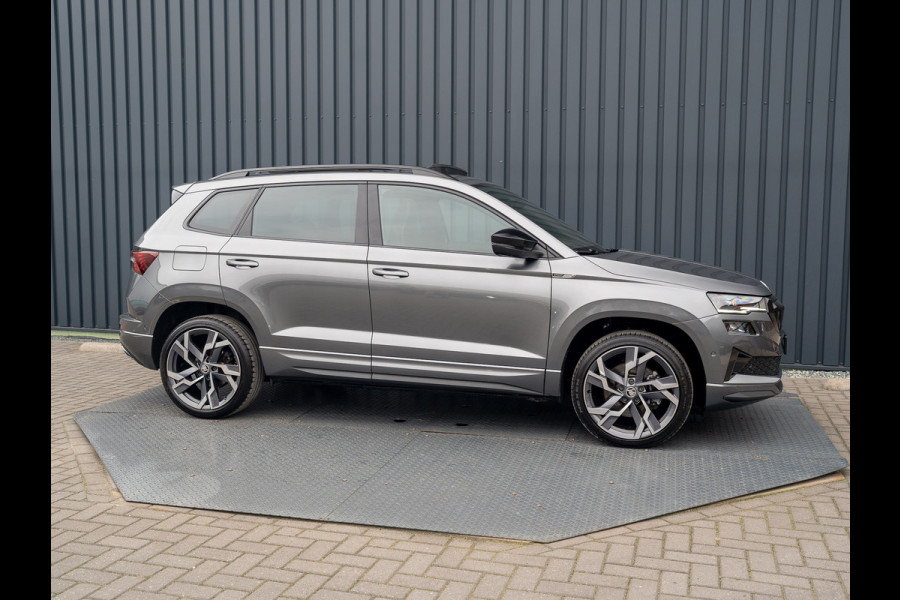 Škoda Karoq 1.5 TSI ACT Sportline Business | Panodak | Trekhaak wegkl. | 360 Camera | 19'' | Elk. A-klep | Prijs Rijklaar!! Škoda Karoq 1.5 TSI ACT Sportline Business | Panodak | Trekhaak wegkl. | 360 Camera | 19'' | Elk. A-klep | Prijs Rijklaar!!
