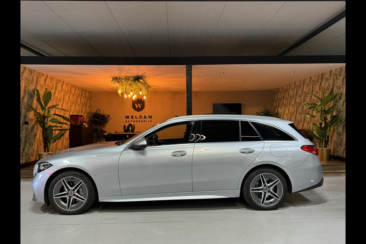 Mercedes-Benz C-Klasse Estate 300 e AMG Line Garantie Trekhaak Massage Pano Ambient 360 Blindspot Elek Achterklep StoelVW Rijklaar Mercedes-Benz C-Klasse Estate 300 e AMG Line Garantie Trekhaak Massage Pano Ambient 360 Blindspot Elek Achterklep StoelVW Rijklaar