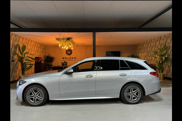 Mercedes-Benz C-Klasse Estate 300 e AMG Line Garantie Trekhaak Massage Pano Ambient 360 Blindspot Elek Achterklep StoelVW Rijklaar Mercedes-Benz C-Klasse Estate 300 e AMG Line Garantie Trekhaak Massage Pano Ambient 360 Blindspot Elek Achterklep StoelVW Rijklaar
