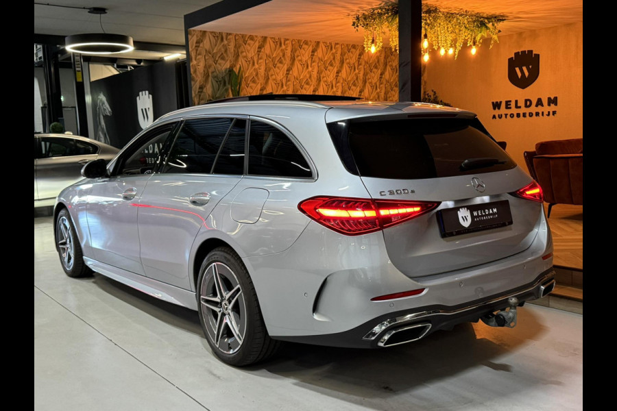 Mercedes-Benz C-Klasse Estate 300 e AMG Line Garantie Trekhaak Massage Pano Ambient 360 Blindspot Elek Achterklep StoelVW Rijklaar Mercedes-Benz C-Klasse Estate 300 e AMG Line Garantie Trekhaak Massage Pano Ambient 360 Blindspot Elek Achterklep StoelVW Rijklaar