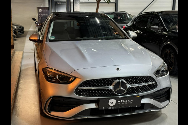 Mercedes-Benz C-Klasse Estate 300 e AMG Line Garantie Trekhaak Massage Pano Ambient 360 Blindspot Elek Achterklep StoelVW Rijklaar Mercedes-Benz C-Klasse Estate 300 e AMG Line Garantie Trekhaak Massage Pano Ambient 360 Blindspot Elek Achterklep StoelVW Rijklaar