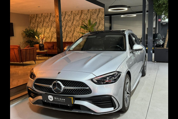Mercedes-Benz C-Klasse Estate 300 e AMG Line Garantie Trekhaak Massage Pano Ambient 360 Blindspot Elek Achterklep StoelVW Rijklaar Mercedes-Benz C-Klasse Estate 300 e AMG Line Garantie Trekhaak Massage Pano Ambient 360 Blindspot Elek Achterklep StoelVW Rijklaar