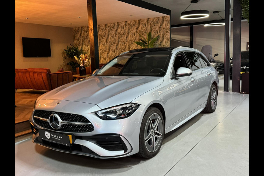 Mercedes-Benz C-Klasse Estate 300 e AMG Line Garantie Trekhaak Massage Pano Ambient 360 Blindspot Elek Achterklep StoelVW Rijklaar Mercedes-Benz C-Klasse Estate 300 e AMG Line Garantie Trekhaak Massage Pano Ambient 360 Blindspot Elek Achterklep StoelVW Rijklaar