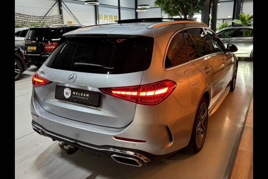 Mercedes-Benz C-Klasse Estate 300 e AMG Line Garantie Trekhaak Massage Pano Ambient 360 Blindspot Elek Achterklep StoelVW Rijklaar Mercedes-Benz C-Klasse Estate 300 e AMG Line Garantie Trekhaak Massage Pano Ambient 360 Blindspot Elek Achterklep StoelVW Rijklaar