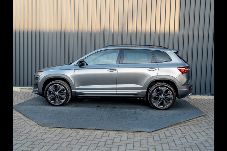 Škoda Karoq 1.5 TSI 150Pk ACT Sportline Business | Trekhaak wegkl. | Elk. A-klep | Camera | Keyless | Adapt. Cr. | Prijs Rijklaar!! Škoda Karoq 1.5 TSI 150Pk ACT Sportline Business | Trekhaak wegkl. | Elk. A-klep | Camera | Keyless | Adapt. Cr. | Prijs Rijklaar!!