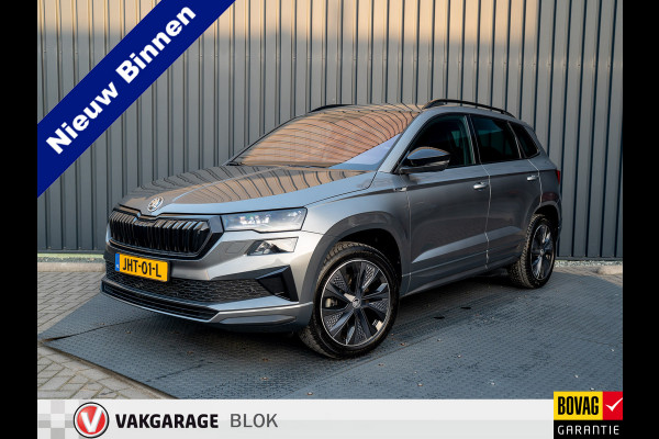 Škoda Karoq 1.5 TSI 150Pk ACT Sportline Business | Trekhaak wegkl. | Elk. A-klep | Camera | Keyless | Adapt. Cr. | Prijs Rijklaar!! Škoda Karoq 1.5 TSI 150Pk ACT Sportline Business | Trekhaak wegkl. | Elk. A-klep | Camera | Keyless | Adapt. Cr. | Prijs Rijklaar!!