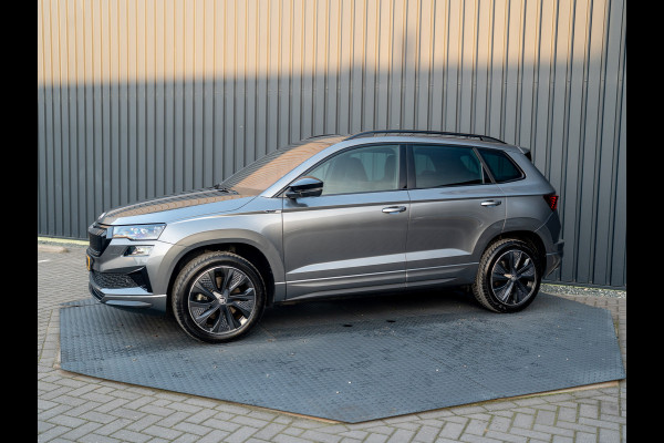 Škoda Karoq 1.5 TSI 150Pk ACT Sportline Business | Trekhaak wegkl. | Elk. A-klep | Camera | Keyless | Adapt. Cr. | Prijs Rijklaar!! Škoda Karoq 1.5 TSI 150Pk ACT Sportline Business | Trekhaak wegkl. | Elk. A-klep | Camera | Keyless | Adapt. Cr. | Prijs Rijklaar!!