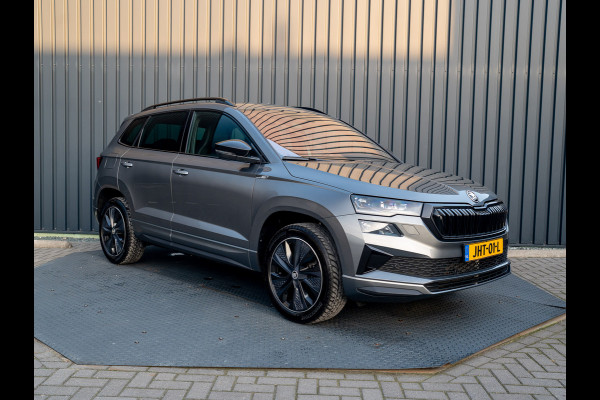 Škoda Karoq 1.5 TSI 150Pk ACT Sportline Business | Trekhaak wegkl. | Elk. A-klep | Camera | Keyless | Adapt. Cr. | Prijs Rijklaar!! Škoda Karoq 1.5 TSI 150Pk ACT Sportline Business | Trekhaak wegkl. | Elk. A-klep | Camera | Keyless | Adapt. Cr. | Prijs Rijklaar!!