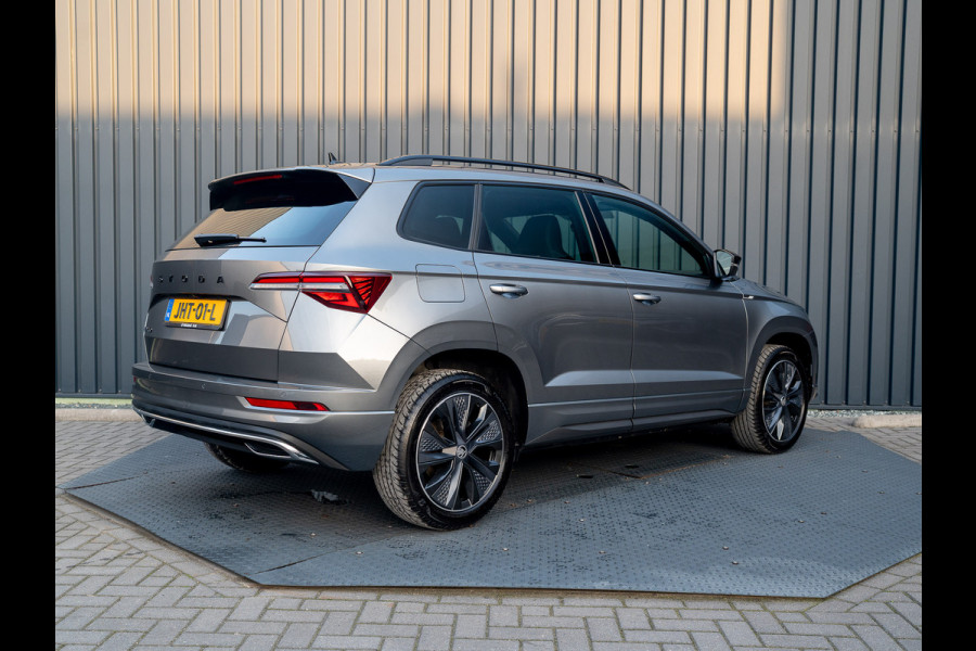 Škoda Karoq 1.5 TSI 150Pk ACT Sportline Business | Trekhaak wegkl. | Elk. A-klep | Camera | Keyless | Adapt. Cr. | Prijs Rijklaar!! Škoda Karoq 1.5 TSI 150Pk ACT Sportline Business | Trekhaak wegkl. | Elk. A-klep | Camera | Keyless | Adapt. Cr. | Prijs Rijklaar!!