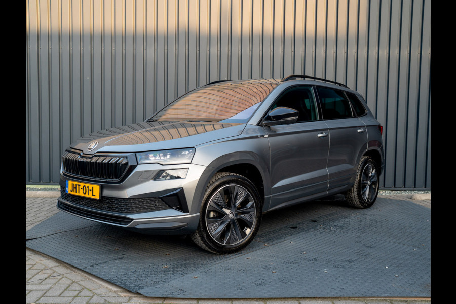 Škoda Karoq 1.5 TSI 150Pk ACT Sportline Business | Trekhaak wegkl. | Elk. A-klep | Camera | Keyless | Adapt. Cr. | Prijs Rijklaar!! Škoda Karoq 1.5 TSI 150Pk ACT Sportline Business | Trekhaak wegkl. | Elk. A-klep | Camera | Keyless | Adapt. Cr. | Prijs Rijklaar!!