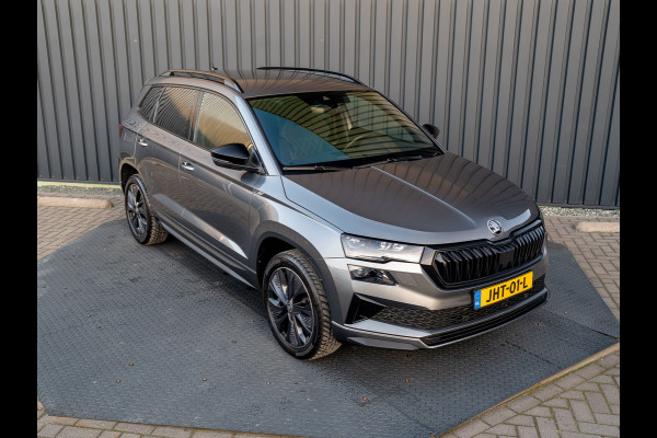 Škoda Karoq 1.5 TSI 150Pk ACT Sportline Business | Trekhaak wegkl. | Elk. A-klep | Camera | Keyless | Adapt. Cr. | Prijs Rijklaar!! Škoda Karoq 1.5 TSI 150Pk ACT Sportline Business | Trekhaak wegkl. | Elk. A-klep | Camera | Keyless | Adapt. Cr. | Prijs Rijklaar!!