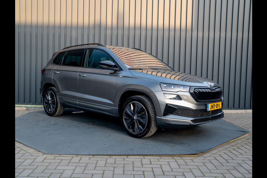 Škoda Karoq 1.5 TSI 150Pk ACT Sportline Business | Trekhaak wegkl. | Elk. A-klep | Camera | Keyless | Adapt. Cr. | Prijs Rijklaar!! Škoda Karoq 1.5 TSI 150Pk ACT Sportline Business | Trekhaak wegkl. | Elk. A-klep | Camera | Keyless | Adapt. Cr. | Prijs Rijklaar!!