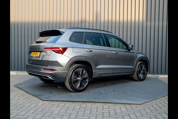 Škoda Karoq 1.5 TSI 150Pk ACT Sportline Business | Trekhaak wegkl. | Elk. A-klep | Camera | Keyless | Adapt. Cr. | Prijs Rijklaar!! Škoda Karoq 1.5 TSI 150Pk ACT Sportline Business | Trekhaak wegkl. | Elk. A-klep | Camera | Keyless | Adapt. Cr. | Prijs Rijklaar!!