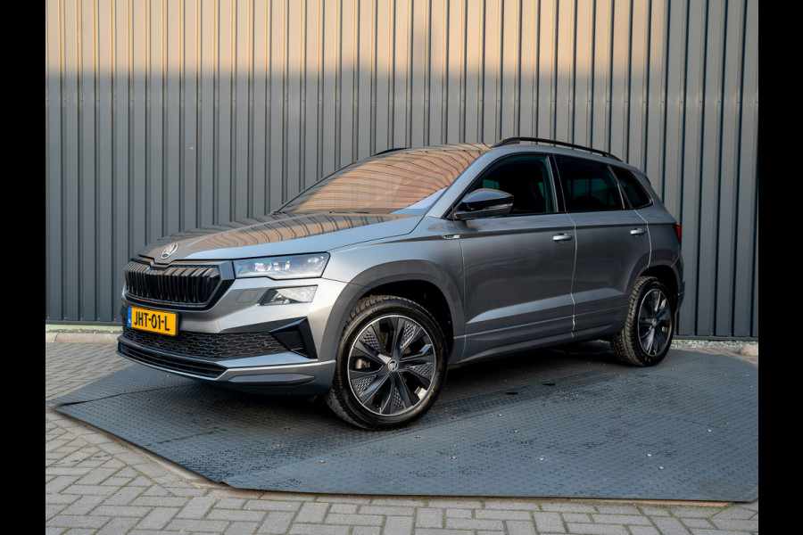 Škoda Karoq 1.5 TSI 150Pk ACT Sportline Business | Trekhaak wegkl. | Elk. A-klep | Camera | Keyless | Adapt. Cr. | Prijs Rijklaar!! Škoda Karoq 1.5 TSI 150Pk ACT Sportline Business | Trekhaak wegkl. | Elk. A-klep | Camera | Keyless | Adapt. Cr. | Prijs Rijklaar!!
