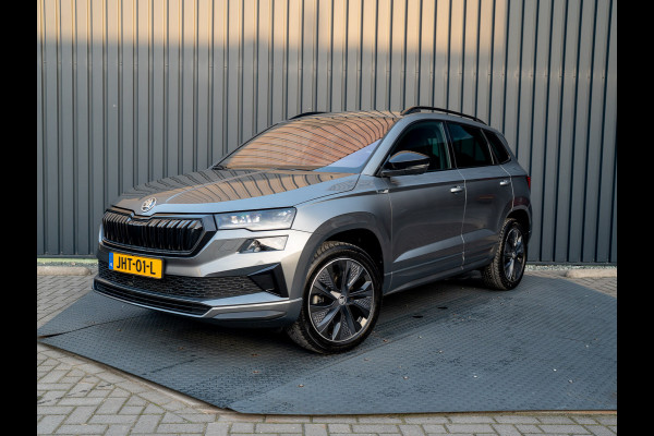 Škoda Karoq 1.5 TSI 150Pk ACT Sportline Business | Trekhaak wegkl. | Elk. A-klep | Camera | Keyless | Adapt. Cr. | Prijs Rijklaar!! Škoda Karoq 1.5 TSI 150Pk ACT Sportline Business | Trekhaak wegkl. | Elk. A-klep | Camera | Keyless | Adapt. Cr. | Prijs Rijklaar!!