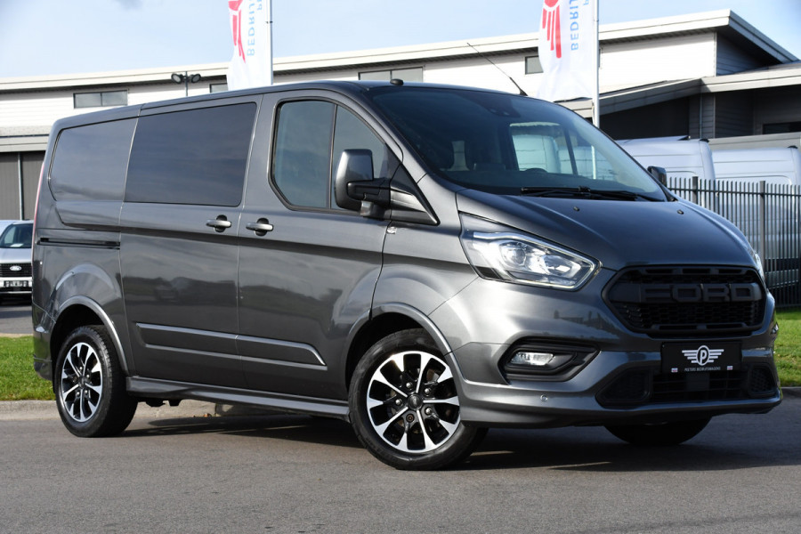 Ford Transit Custom 2.0 TDCI L1H1 Sport DC Camera, Cruise, Carplay, 170pk, Automaat, Leder, Trekhaak, Stoelverwarming, NAVI, Uniek! Ford Transit Custom 2.0 TDCI L1H1 Sport DC Camera, Cruise, Carplay, 170pk, Automaat, Leder, Trekhaak, Stoelverwarming, NAVI, Uniek!
