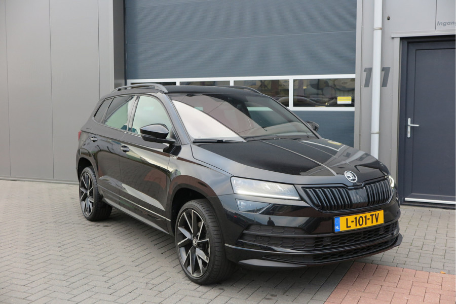 Škoda Karoq 1.5 TSI ACT 150pk Sportline Business Stoelverwarming , Led verlichting , DAB+ radio , Carplay ,Canton sound systeem, Achteruitrijcamera , Parkeersensoren ,Electr. achterklep ,etc. Škoda Karoq 1.5 TSI ACT 150pk Sportline Business Stoelverwarming , Led verlichting , DAB+ radio , Carplay ,Canton sound systeem, Achteruitrijcamera , Parkeersensoren ,Electr. achterklep ,etc.