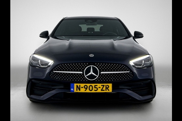 Mercedes-Benz C-Klasse 180 AMG Line Multispaaks lichtmetalen velgen 19 inch. Navigatie | parking support met camera achter | Inclusief 24 maanden MB Certified garantie voor Europa.