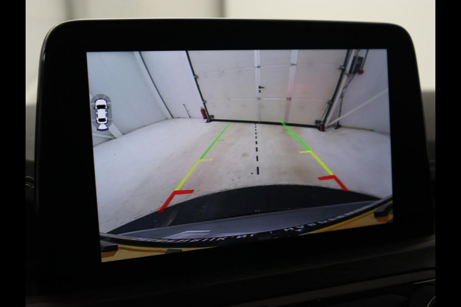 Ford Kuga 2.5 PHEV Vignale | Head-Up | Trekhaak | Adaptive cruise | Leder | 360 Camera | Stoelverwarming | Digital Cockpit | Carplay | Dodehoek detectie | Navigatie | Keyless | Achterbankverwarming | Plug In