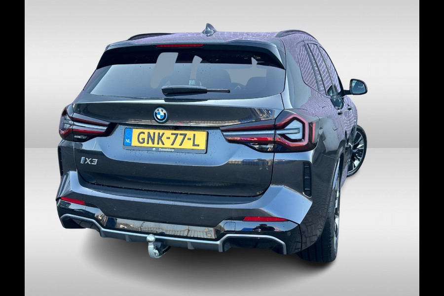 BMW iX3 High Executive Edition 80 kWh / Trekhaak / Panoramadak / 360Camera / Head-up / 20'' / Leder / Harman Kardon / Sfeerverlichting / Dodehoek / DAB / Stuur+Stoelverwarming / ACC