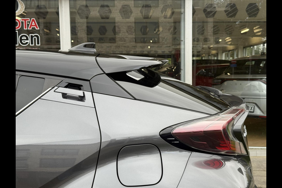 Toyota C-HR 1.8 Hybrid Bi-Tone Plus | Leer, Stoel + Stuurverwarming, Navigatie, Dodehoekherkenning, Parkeersensoren