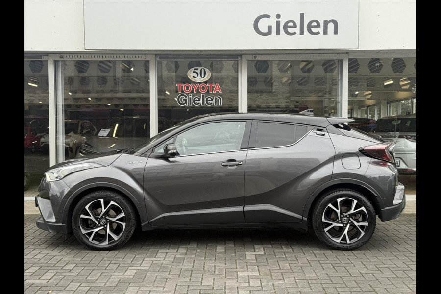 Toyota C-HR 1.8 Hybrid Bi-Tone Plus | Leer, Stoel + Stuurverwarming, Navigatie, Dodehoekherkenning, Parkeersensoren