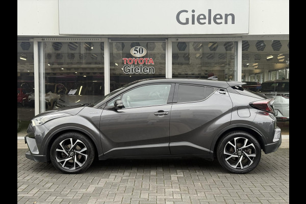 Toyota C-HR 1.8 Hybrid Bi-Tone Plus | Leer, Stoel + Stuurverwarming, Navigatie, Dodehoekherkenning, Parkeersensoren