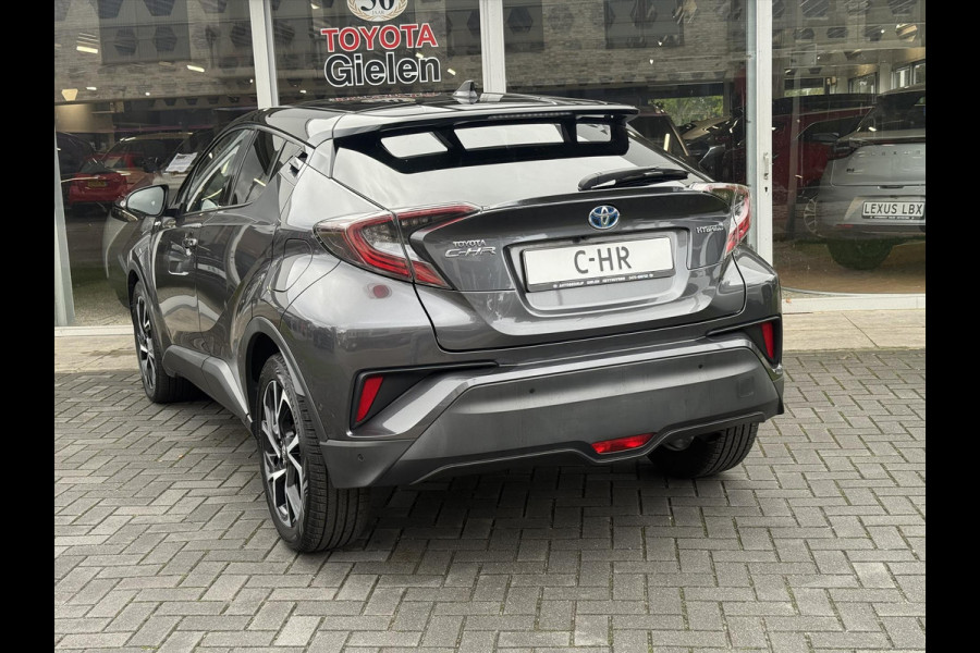 Toyota C-HR 1.8 Hybrid Bi-Tone Plus | Leer, Stoel + Stuurverwarming, Navigatie, Dodehoekherkenning, Parkeersensoren