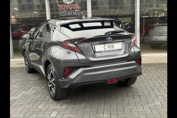 Toyota C-HR 1.8 Hybrid Bi-Tone Plus | Leer, Stoel + Stuurverwarming, Navigatie, Dodehoekherkenning, Parkeersensoren