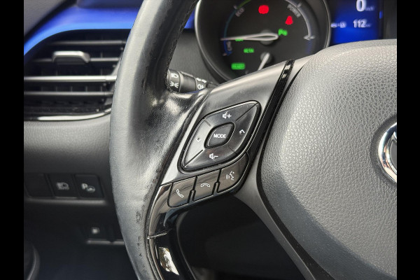 Toyota C-HR 1.8 Hybrid Bi-Tone Plus | Leer, Stoel + Stuurverwarming, Navigatie, Dodehoekherkenning, Parkeersensoren
