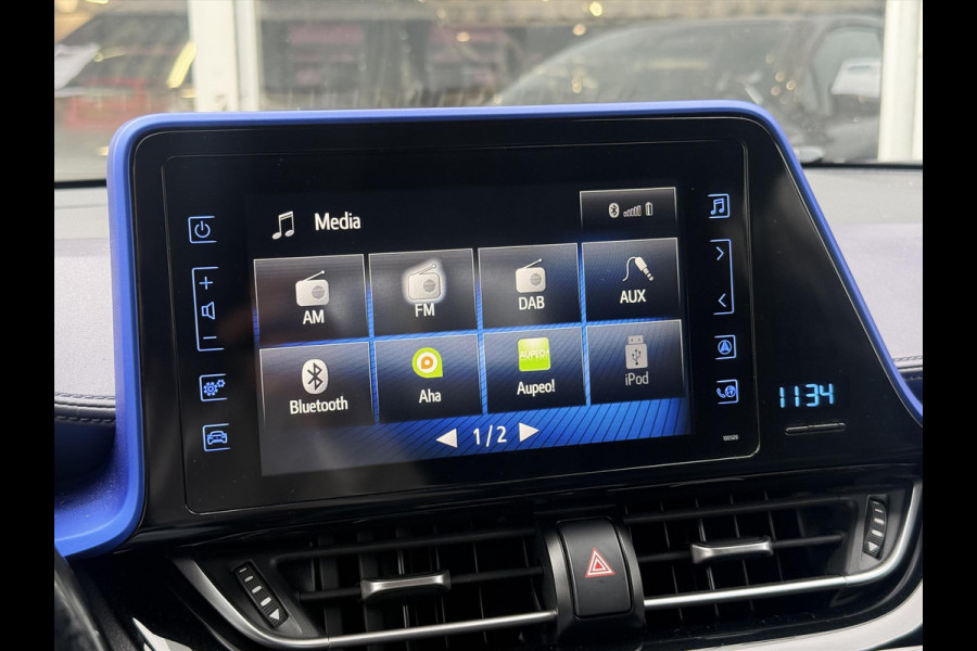 Toyota C-HR 1.8 Hybrid Bi-Tone Plus | Leer, Stoel + Stuurverwarming, Navigatie, Dodehoekherkenning, Parkeersensoren