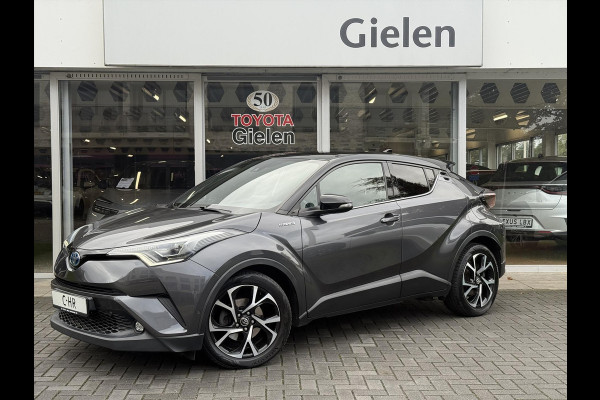 Toyota C-HR 1.8 Hybrid Bi-Tone Plus | Leer, Stoel + Stuurverwarming, Navigatie, Dodehoekherkenning, Parkeersensoren