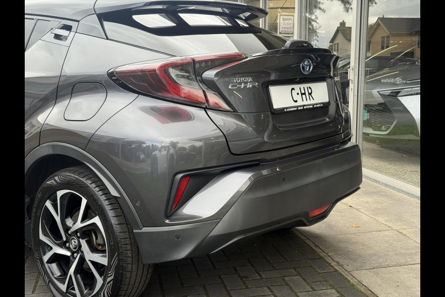 Toyota C-HR 1.8 Hybrid Bi-Tone Plus | Leer, Stoel + Stuurverwarming, Navigatie, Dodehoekherkenning, Parkeersensoren